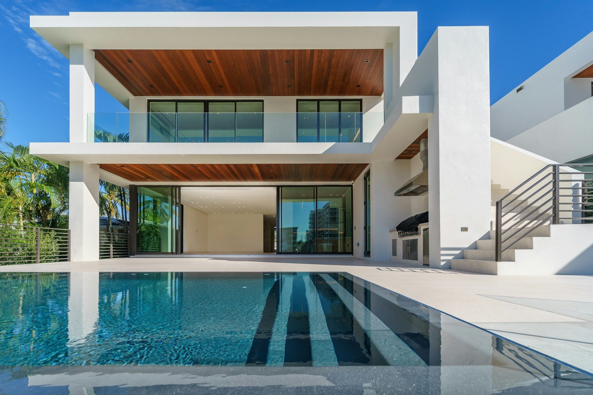 Modern white house with a pool